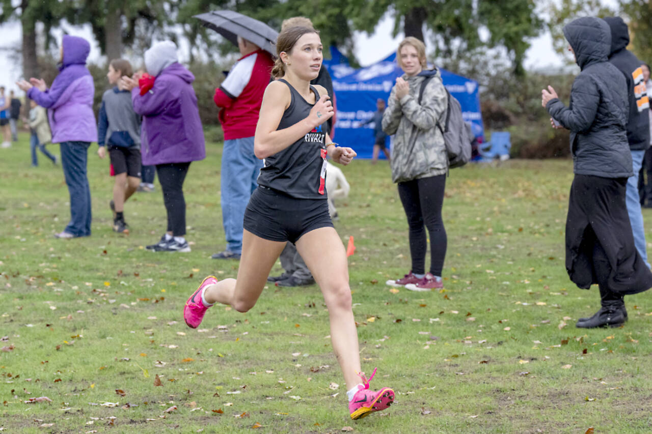 East Jefferson Rival Aliyah Yearian distances herself from the other 39 competitors during the girls varsity cross country 5K meet against multiple schools at Port Townsend Golf Course on Tuesday. Yearian and her teammate Fiona Fraser finished one-two at the race. (Steve Mullensky/for Peninsula Daily News)