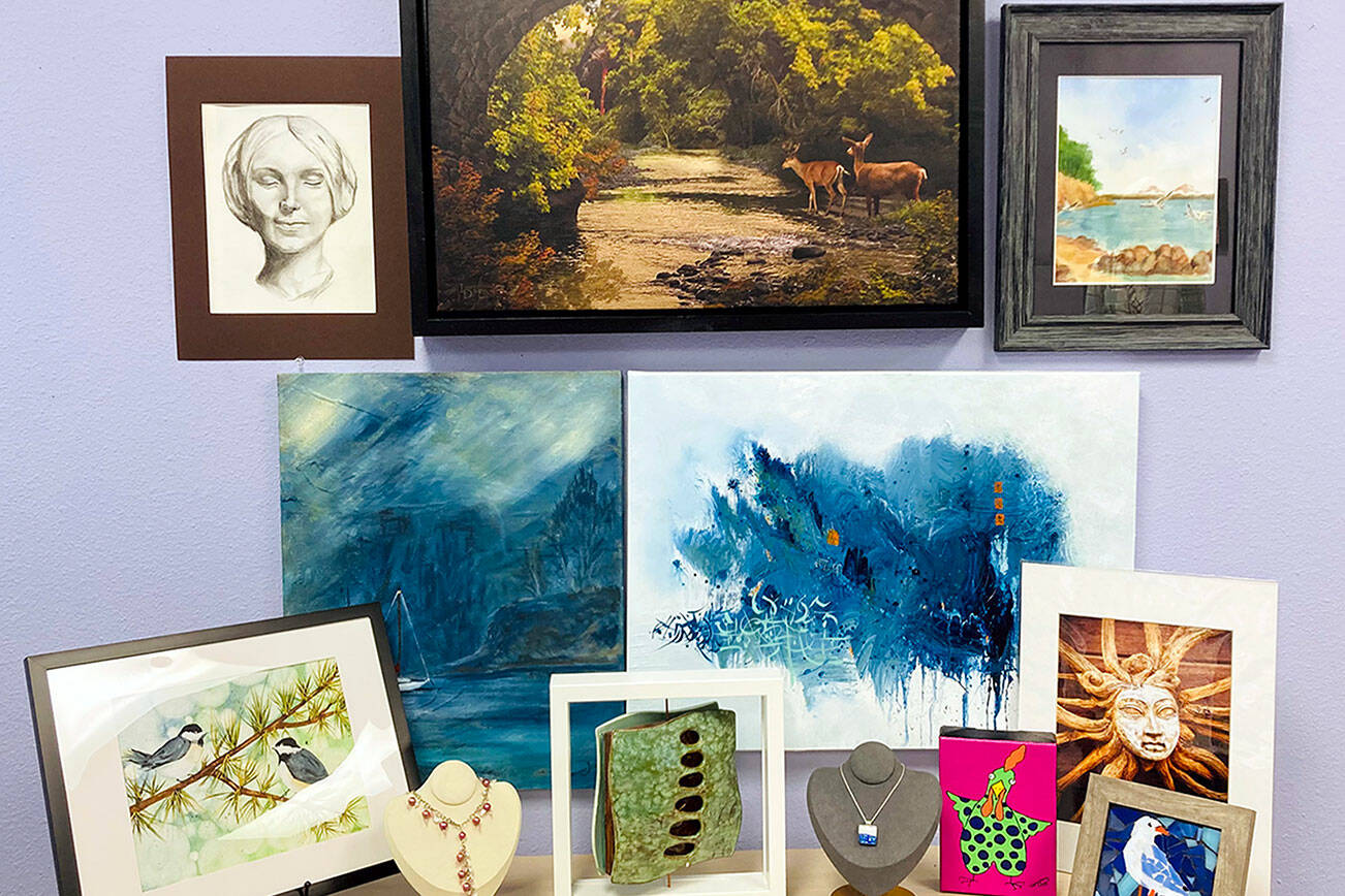 The Port Ludlow Art League's artists of the month for January at the league's board of directors. Work will be on view that month at Sound Community Bank and online at www.portludlowrt.org.