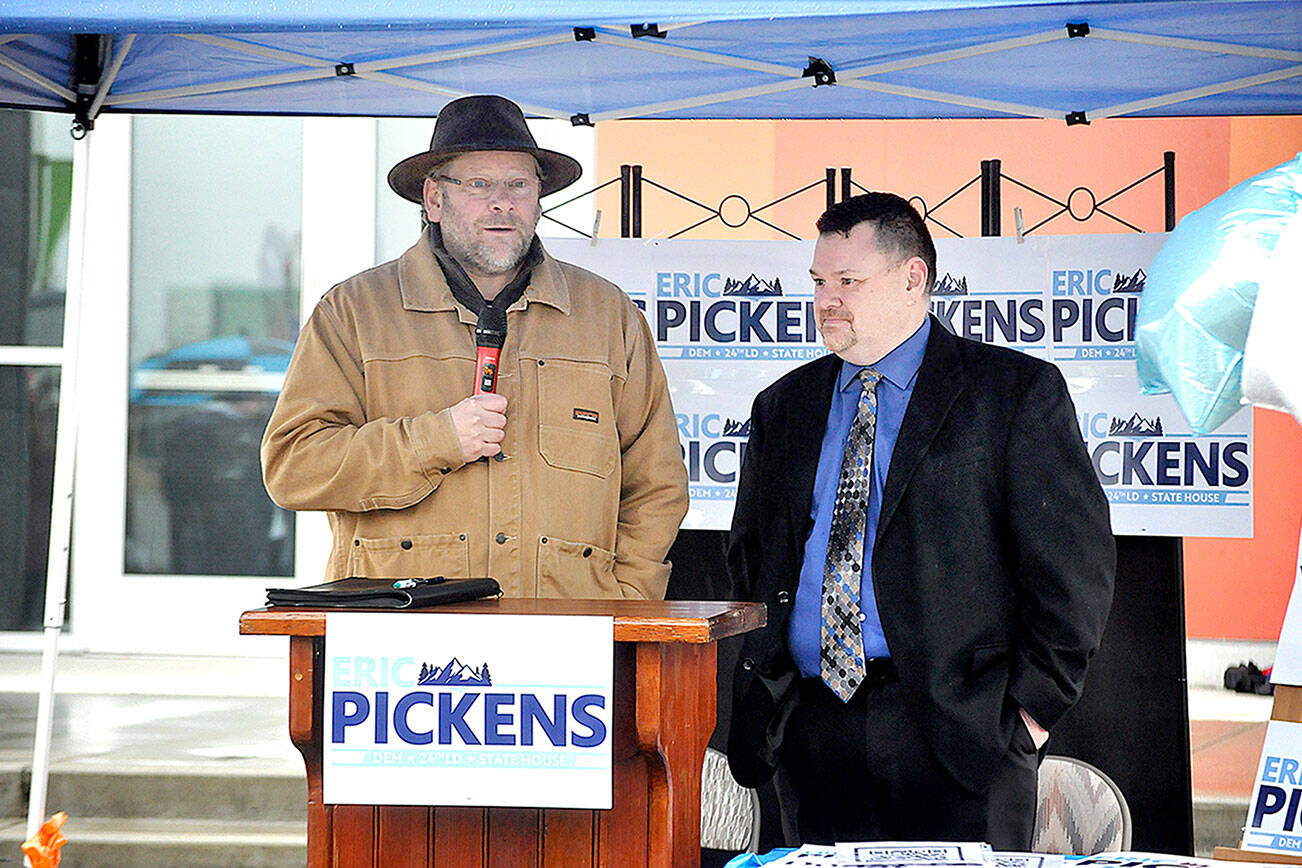 State Rep. Mike Chapman, D-Port Angeles, left, speaks in support of Eric Pickens, D-Sequim. (Matthew Nash/Olympic Peninsula News Group)