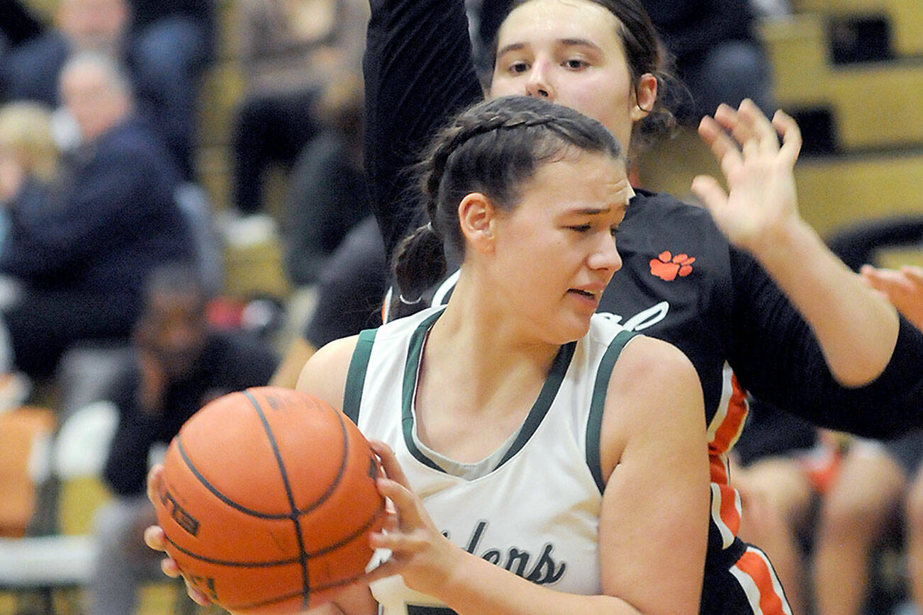 KEITH THORPE/PENINSULA DAILY NEWS
Port Angeles' Lexie Smith, front, looks for away around Central Kitsap's Sam Schaeffer on Saturday in Port Angeles.