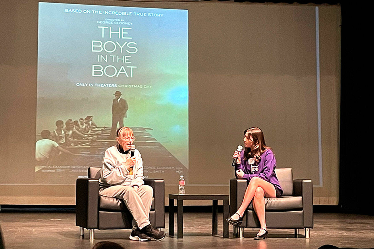 Judy Willman, the daughter of Joe Rantz, is interviewed by Danika Chen, a 2023 Sequim graduate, in the Sequim High School Auditorium on Friday about elements of “The Boys in the Boat” film and how her father is portrayed. Willman said her dad would not want attention but would be OK with it if it supported causes such as restoring the historic ASUW Shell House and building a homeless youth house in Sequim. (Matthew Nash/Olympic Peninsula News Group)