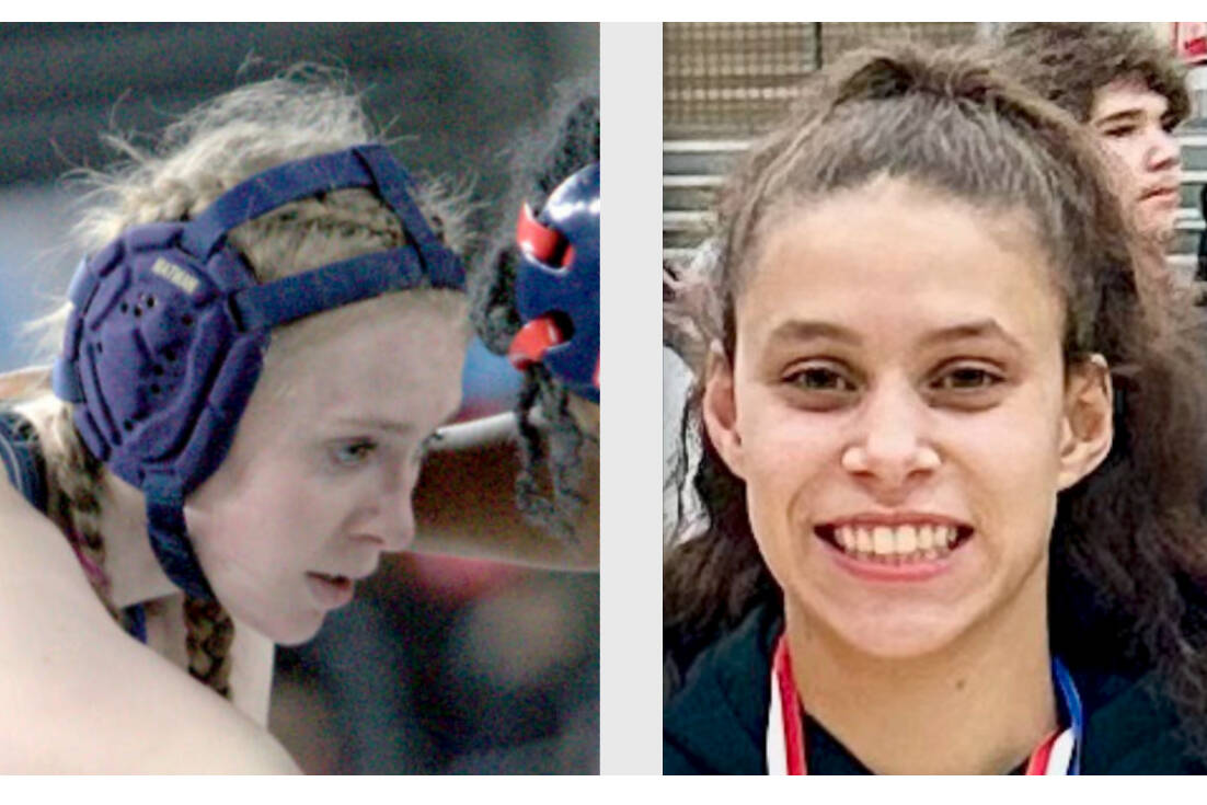 Forks wrestler Miley Blanton and East Jefferson wrestler Mi Amada Lanphear-Ramirez.