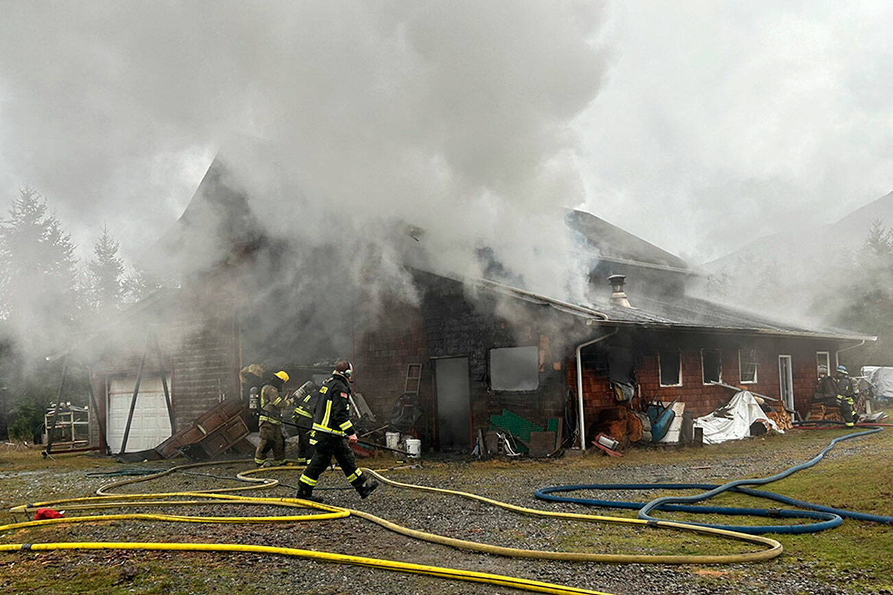 Both Clallam County fire districts 2 and 3 sent firefighters to a barn fire on Blue Mountain Road on Monday afternoon. (Matthew Nash/Olympic Peninsula News Group)