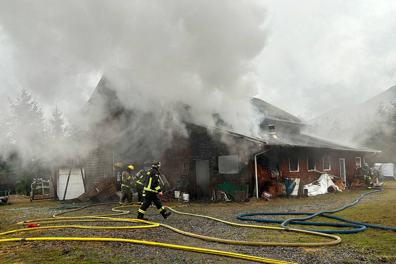 Both Clallam County fire districts 2 and 3 sent firefighters to a barn fire on Blue Mountain Road on Monday afternoon. (Matthew Nash/Olympic Peninsula News Group)