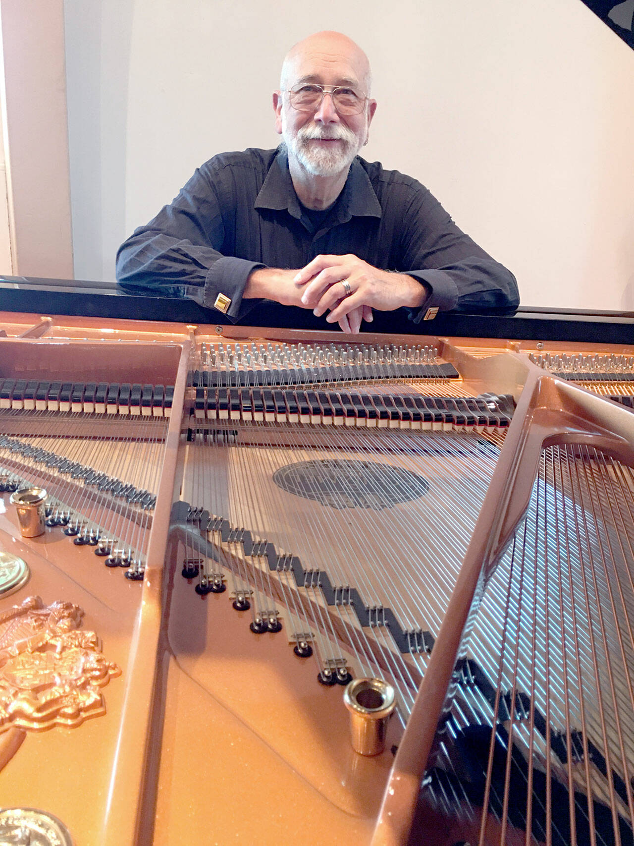 The Candlelight Concert this month will feature classical pianist Mike Carroll.