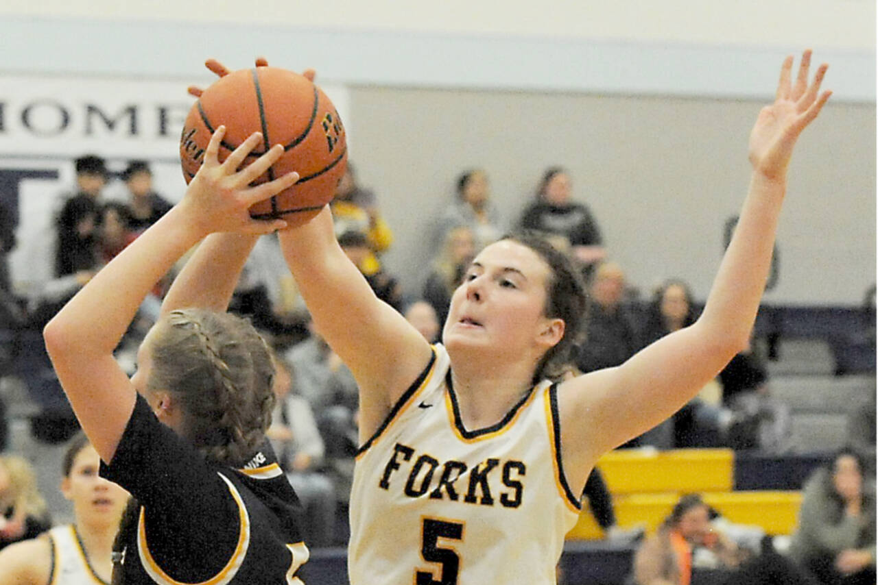 Forks’ Keira Johnson (5) was named the Pacific 2B League Most Valuable Player after leading her team to a 10-0 record in league this season. (Lonnie Archibald/for Peninsula Daily News)