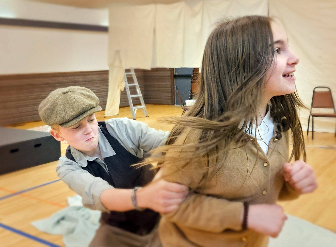 Caleb Sigmund and Isla Siamas rehearse as the lovers for “A Midsummer Night’s Dream.”