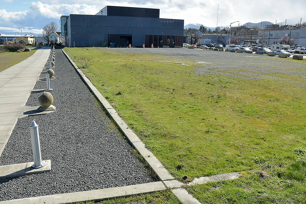 A currently undeveloped area next to the Field Arts & Events Hall will make up the rest of the Port Angeles Waterfront Center — the future home of the Marine Discovery Center and the Lower Elwha Klallam Cultural Center. (Keith Thorpe/Peninsula Daily News)