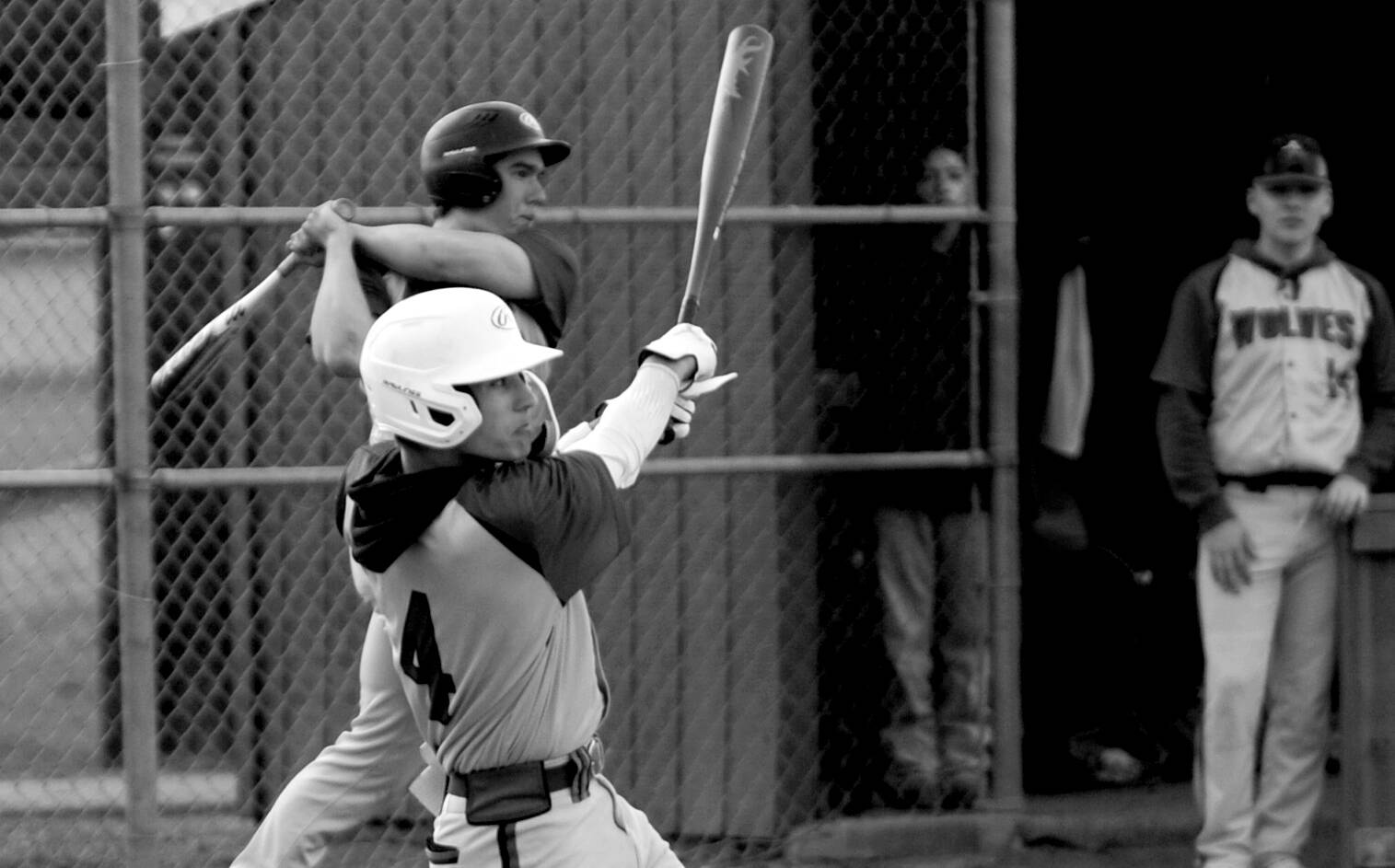 Michael Dashiell/Olympic News Group
Sequim's Bryant Laboy laces a single into left field during the Wolves' contest with North Kitsap on Thursday.