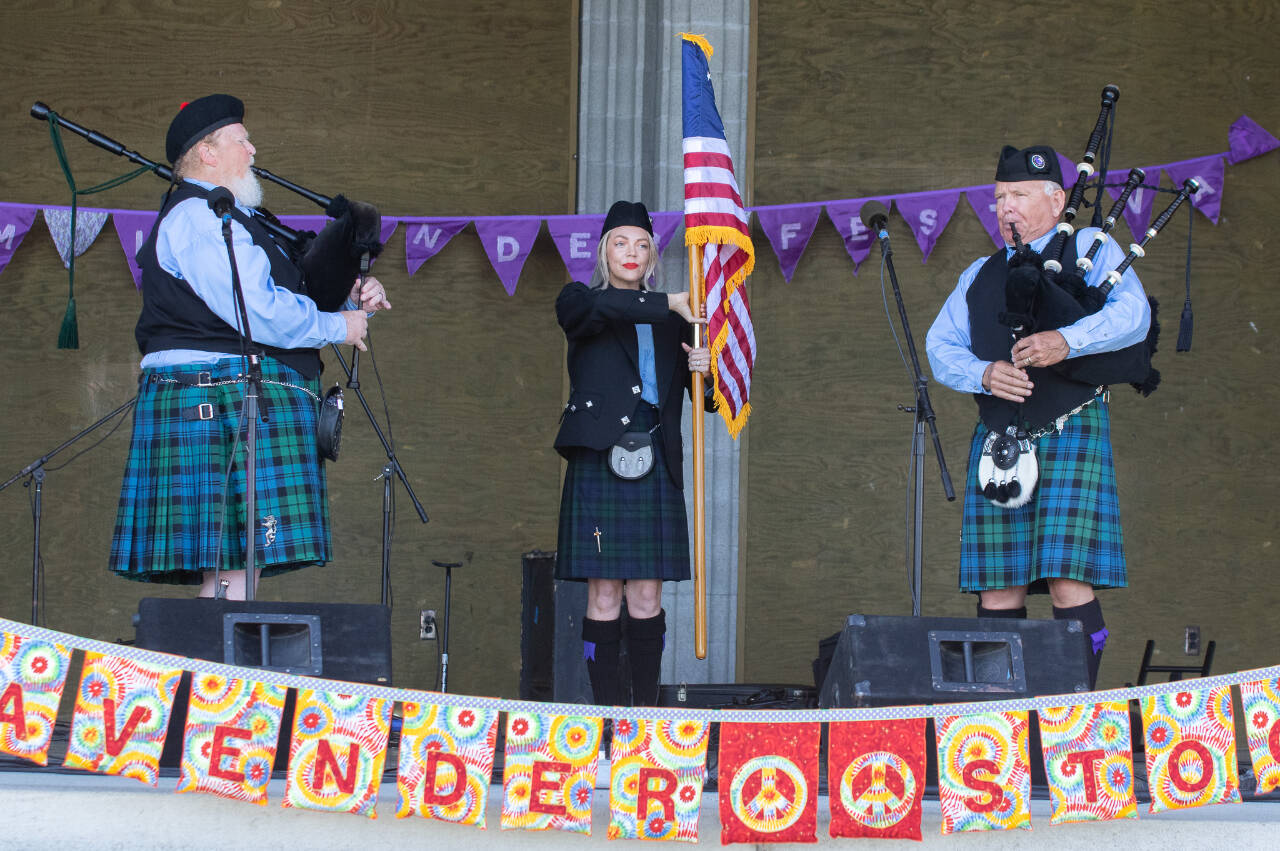 The Parking Lot Pipers, seen performing at the Sequim Lavender Weekend in 2023, are a modern trio keeping up a historically rich musical art form. (Emily Matthiessen/for Olympic Peninsula News Group)
