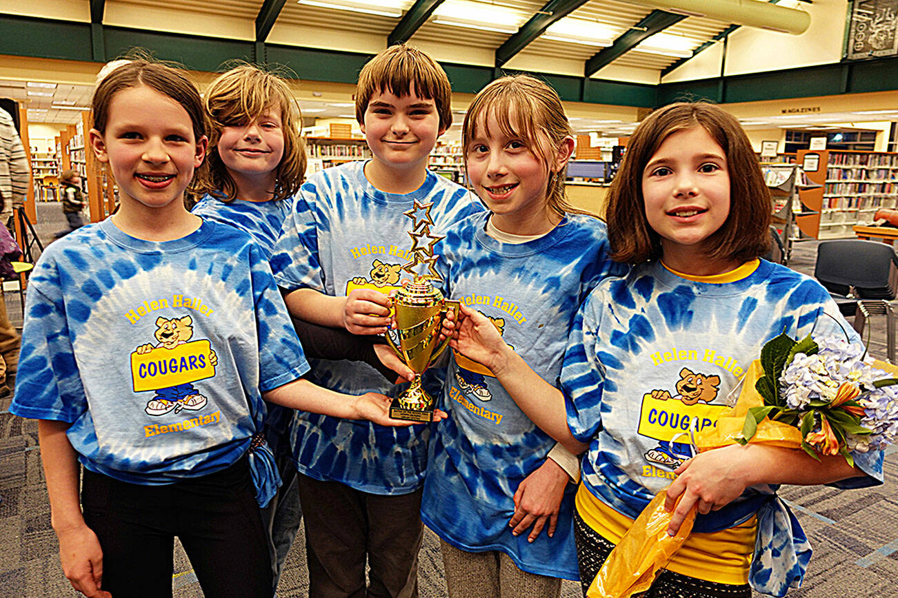 The Blue Titans, from left, Ramsey O’Mera, Miles Angelovic, Winter Radcliffe, Rain Nelson and Mia Miano won the 2024 Battle of the Books on March 22. The fourth-graders represented Sequim’s Helen Haller Elementary School. (North Olympic Library System)