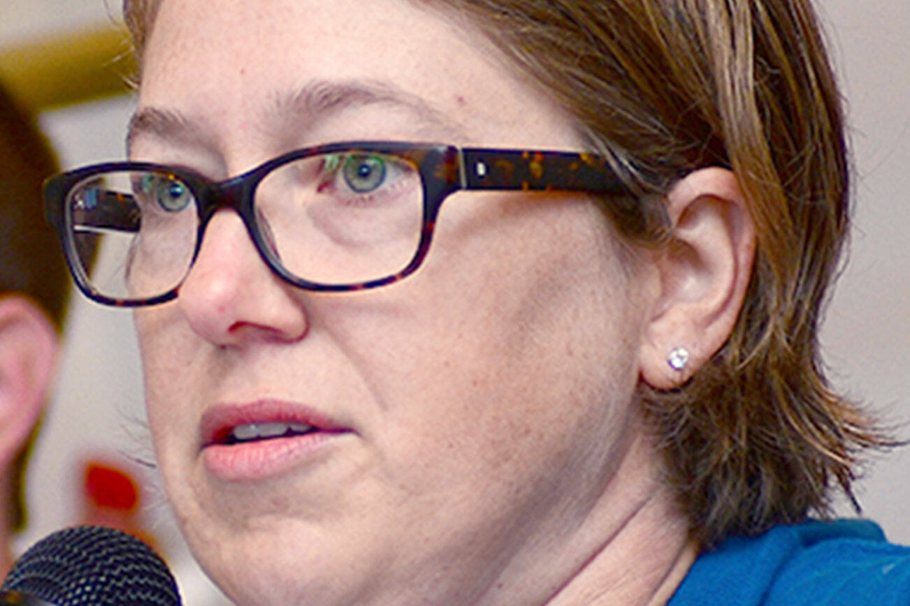 Port Angeles City Council hopefuls Kate Dexter and Travis Berglund answer questions during a Port Angeles Business Association forum Tuesday. (Jesse Major/Peninsula Daily News)