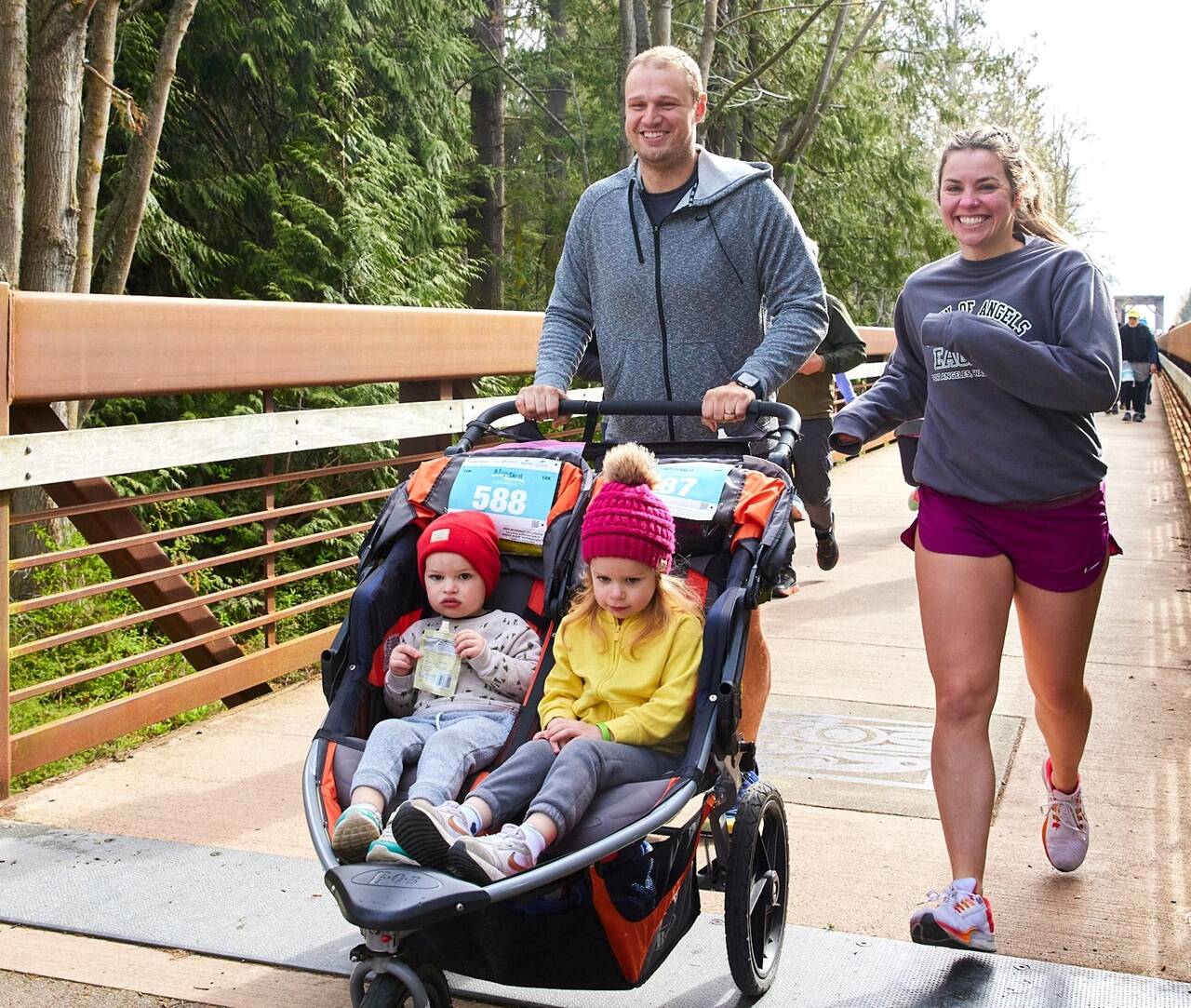 Jeremy and Jessie Gilchrist of Port Angeles take off in the 2023 edition of the Sequim Railroad Bridge Run, part of the Run the Peninsula series. (Matt Sagen/Cascadia Films)