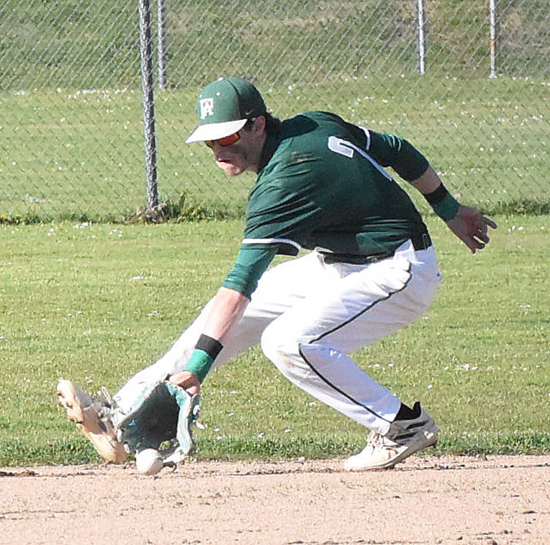 Nicholas Zeller-Singh/Kitsap News Group
Shortstop Alex Angevine makes a play on a ground ball against North Kitsap in an extra tiebreaker game played Tuesday in Poulsbo. North Kitsap was able to hold off Port Angeles 5-2 but the Riders will still be a high seed going into the district tournament.