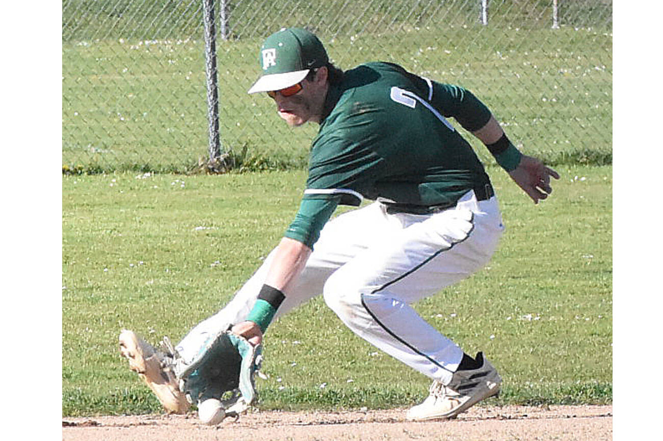 Shortstop Alex Angevine makes a play on a ground ball against North Kitsap in an extra tiebreaker game played Tuesday in Poulsbo. North Kitsap was able to hold off Port Angeles 5-2 but the Riders will still be a high seed going into the district tournament. (Nicholas Zeller-Singh/Kitsap News Group)