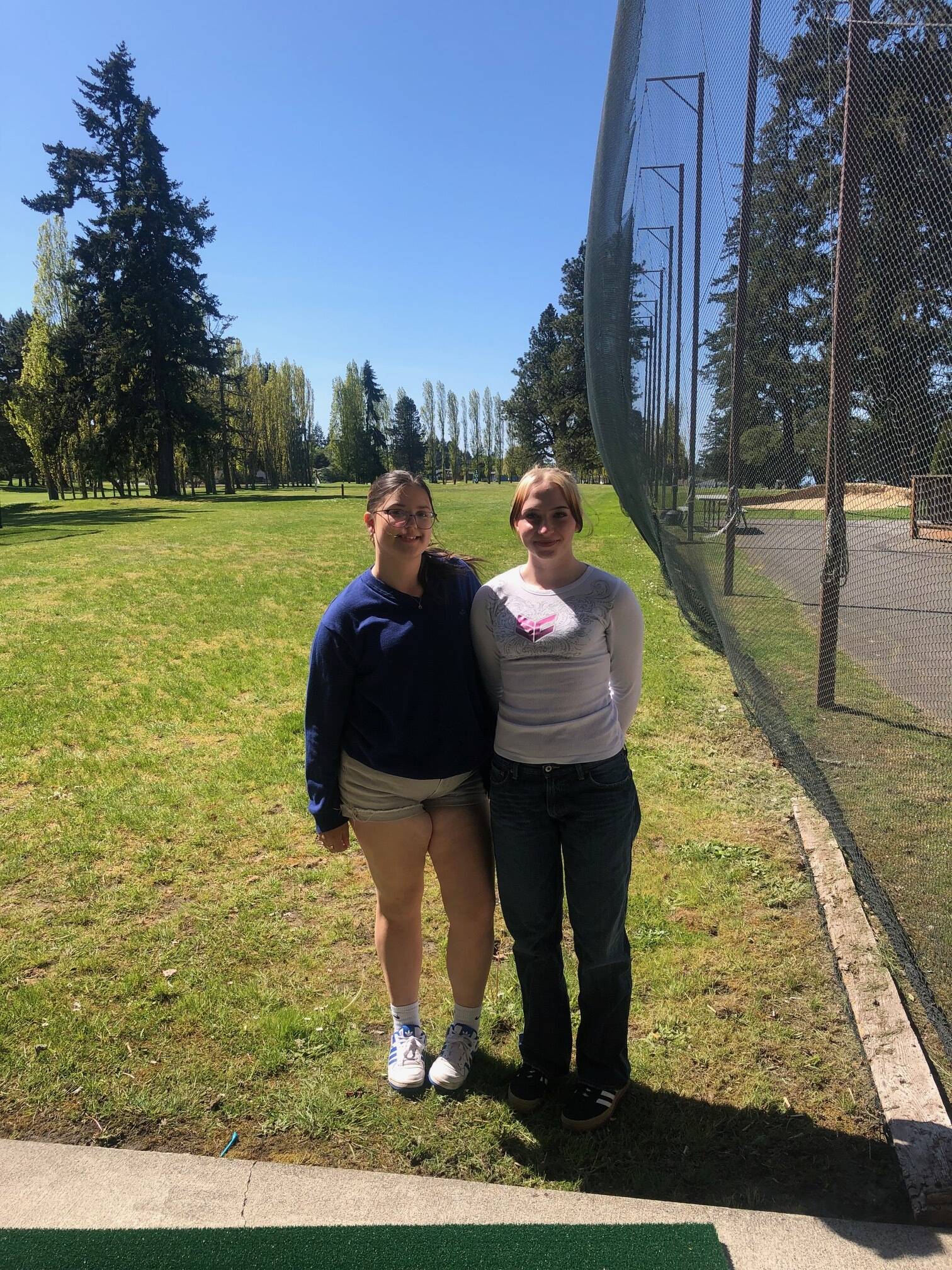 Sequim seniors Ava Johnson, left, and Emily Post extended their high school golf careers by qualifying for the Class 2A State Girls Golf Championship May 21-22 in Liberty Lake with successful rounds Monday at the Olympic League Championships at Bremerton’s Kitsap Golf & Country Club. Johnson, in her second season, finished second overall and Post parred the final hole to earn the fifth seed to state.