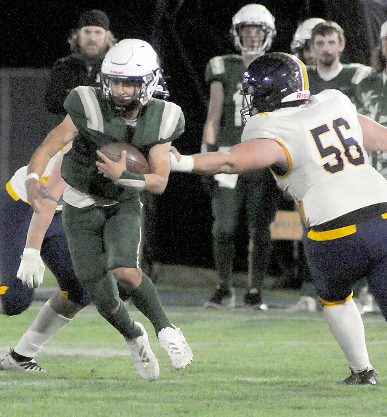 KEITH THORPE/PENINSULA DAILY NEWS
Port Angeles’ Kason Albaugh runs with the ball during an October 2023 contest.The Riders would have a different playoff foe under the “Round of 32” district crossover plan to take effect this fall.