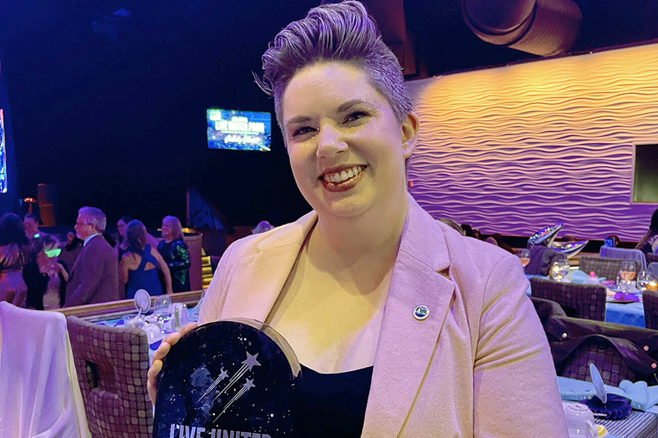 Deputy Mayor Navarra Carr accepts a Live United Award on behalf of the city of Port Angeles.