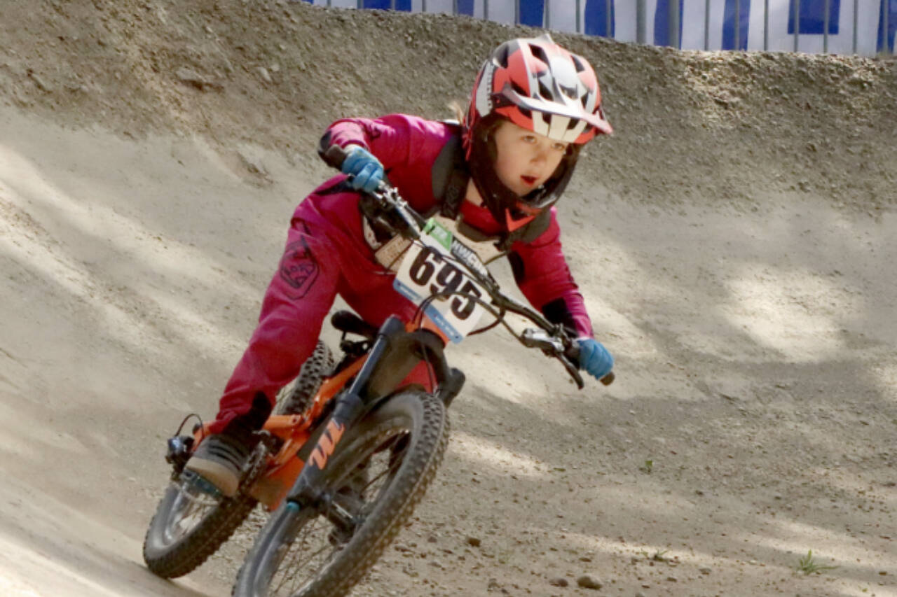 Elon Gromyko of Lynnwood races in the boys' 7 and under category at the second Northwest Cup race in Port Angeles on Sunday. in the U7 men’s category. More than 500 riders from several states and Canadian provinces competed in the three days of downhill racing this weekend. (Dave Logan/for Peninsula Daily News)