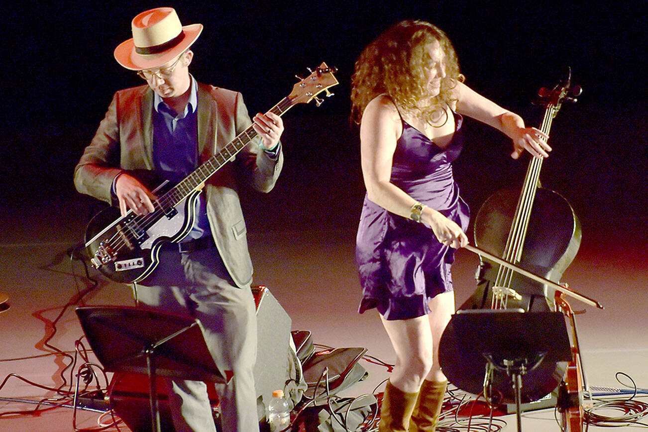 Rebecca Roudman, right, and Colin Williams of the San Francisco Bay area-based Renegade Orchestra take the stage at Field Arts & Events Hall, a Saturday venue of the Juan de Fuca Festival of the Arts. (Keith Thorpe/Peninsula Daily News)