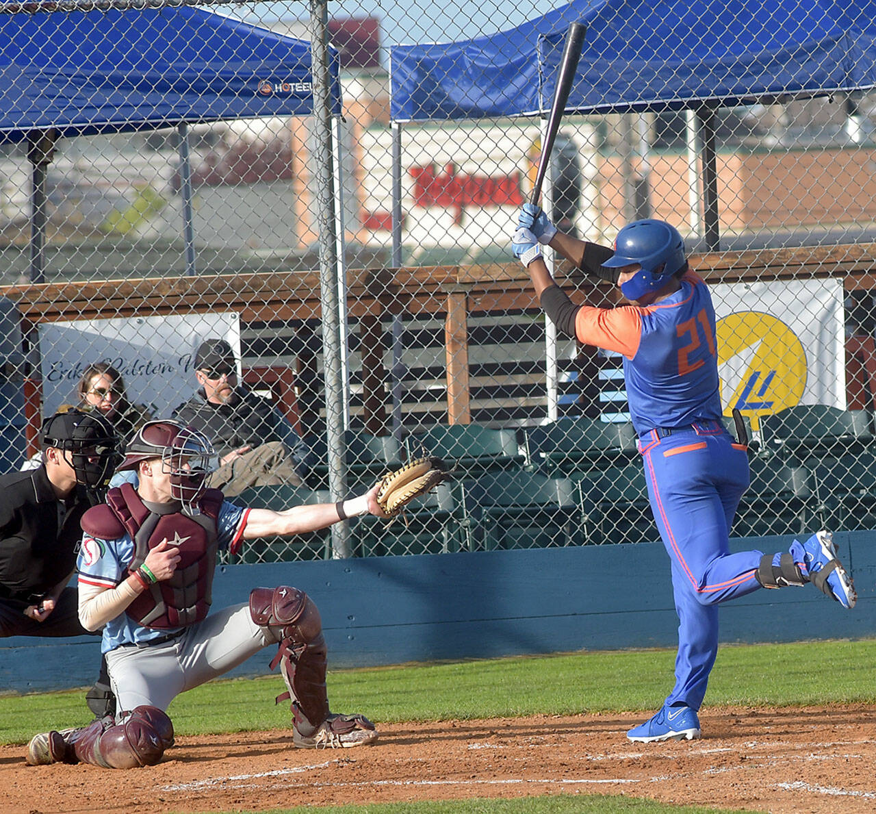 KEITH THORPE/PENINSULA DAILY NEWS
Lefties batter Roberto Garza Núñez, right, is nearly struck by an errant pitch as Wenatchee catcher Joe Scheffler receives the delivery on Wednesday in Port Angeles.