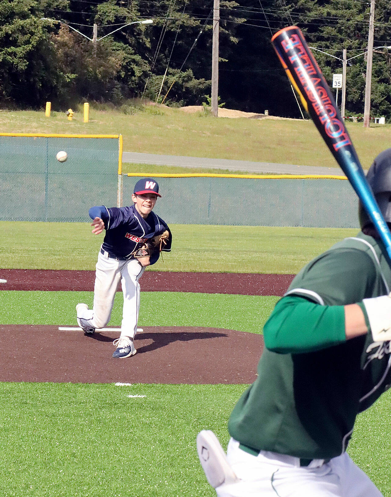 The Olympic Junior Babe Ruth champion Westport team defeated First Federal 3-1 in the title game Tuesday night at Volunteer Field. Westport pitcher Carston Seibel, right, pitched a gem, going 6⅔ innings, allowing three hits and one run while striking out nine. Westport’s Lane Wilson was 2-for-3 and stole three bases and Abe Brenkman was 2-for-2.