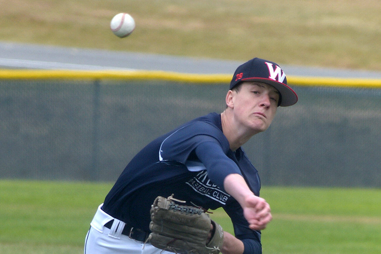 KEITH THORPE/PENINSULA DAILY NEWS
Wilder A pitcher Ethan Swenson pitches against the Maple Ridge, B.C. Royals on Saturday at Volunteer Field in Port Angeles.