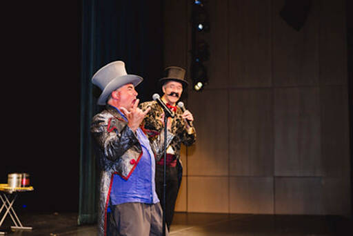 Toga Hertzog, foreground, and Kevin Joyce of EnJoy Productions perform as part of the circus presented in conjunction with Hog Wild. (Olympic Medical Center Foundation)