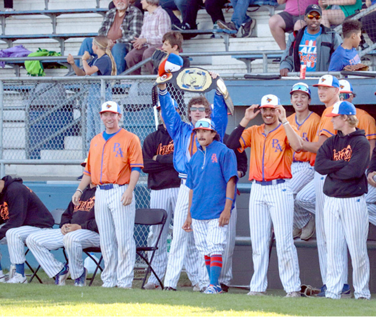 Port Angeles Lefties’ Spencer Dickinson holds the team’s home run championship belt after connecting on his second long ball in as many games at Civic Field Tuesday night against the Redmond Dudes. (Maevis Photography)