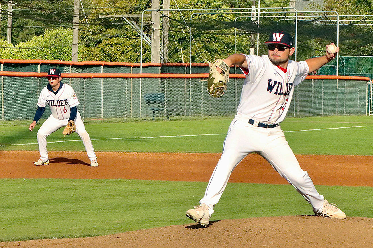 Dave Logan/for Peninsula Daily News
Wilder pitcher Kody Williams winds up to throw in the first inning of Wilder Senior's 10-0 win over Cascade Baseball Club Crush at Civic Field on Thursday. Wilder's Cody Romero backs up the play at third base.