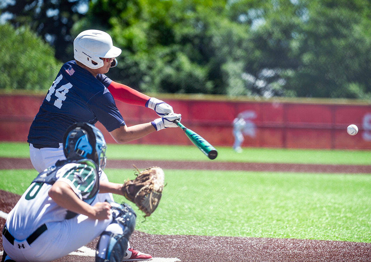 Wilder A’s Duran Ward swings at a Stanwood Cannons pitch during an American Legion baseball game Wednesday in Stanwood. Duran doubled and drove in two runs. (Evan Caldwell)