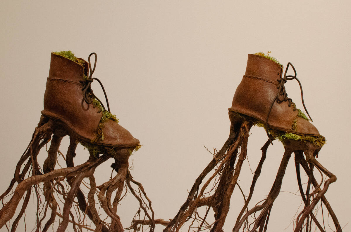 Artist Jeanne K Simmons’ 2023 piece, “Boots with Roots,” is on display at Jefferson County Historical Society Museum of Art + History. (Elijah Sussman/Peninsula Daily News)