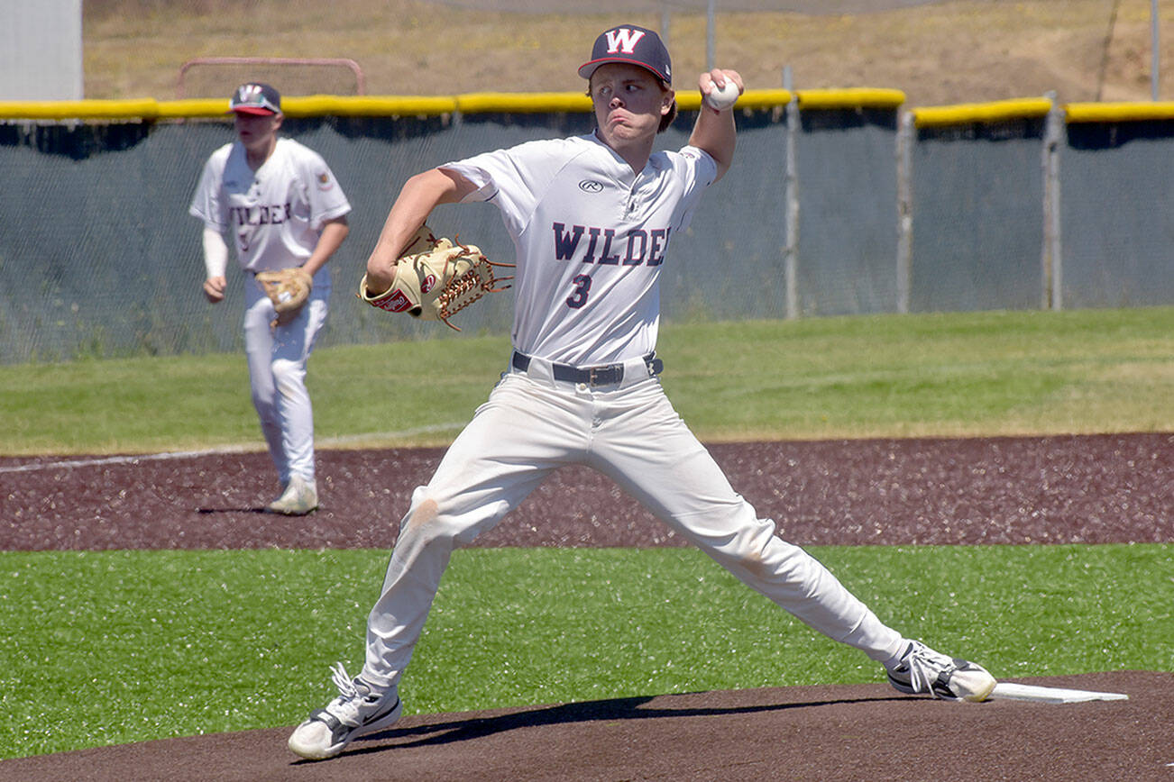 KEITH THORPE/PENINSULA DAILY NEWS
Wilder Junior pitcher Hunter Stratford hurls on Saturday against the Pipeline Pirates AAA as third baseman Brandt Perry looks on during the first game of a Saturday doubleheader at Port Angeles Volunteer Field.
