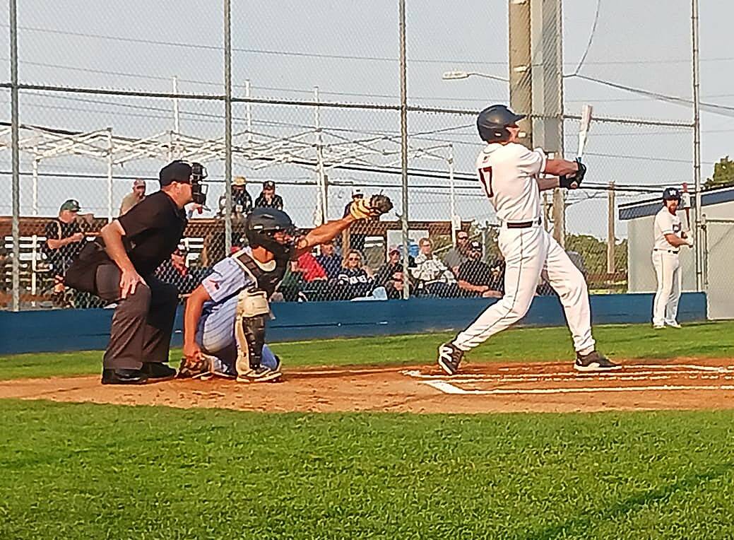 Wilder Senior's Braydan White crushes an RBI double in the first inning against Gonzaga Prep on Saturday night at Civic Field in Wilder's opening game of the AAA American Legion state tournament. (Pierre LaBossiere/Peninsula Daily News)