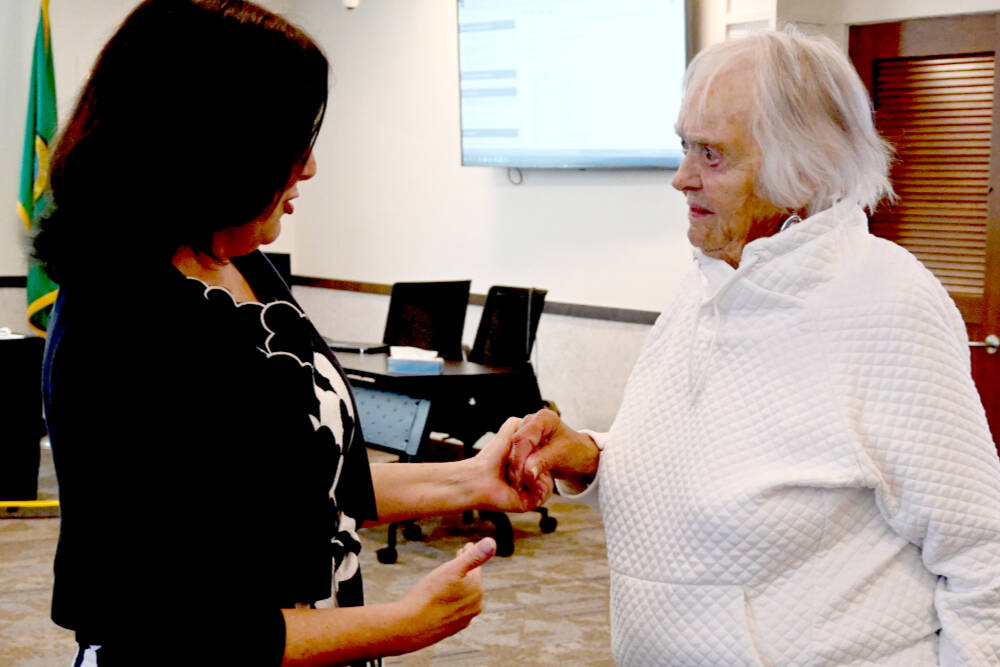 Marylaura Ramponi, right, speaks with Sequim School District superintendent Regan Nickels following the July 15 board meeting. Facilities naming committee members were unanimous in accepting Ramponi’s $1 million donation for the district’s vocational education center. (Michael Dashiell/Olympic Peninsula News Group)