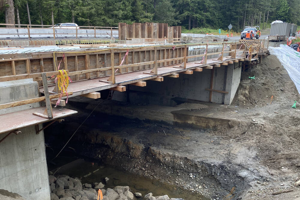 Work continues on a new bridge at Chicken Coop Creek near Blyn, with the project expected to be completed this fall. (Washington State Department of Transportation)