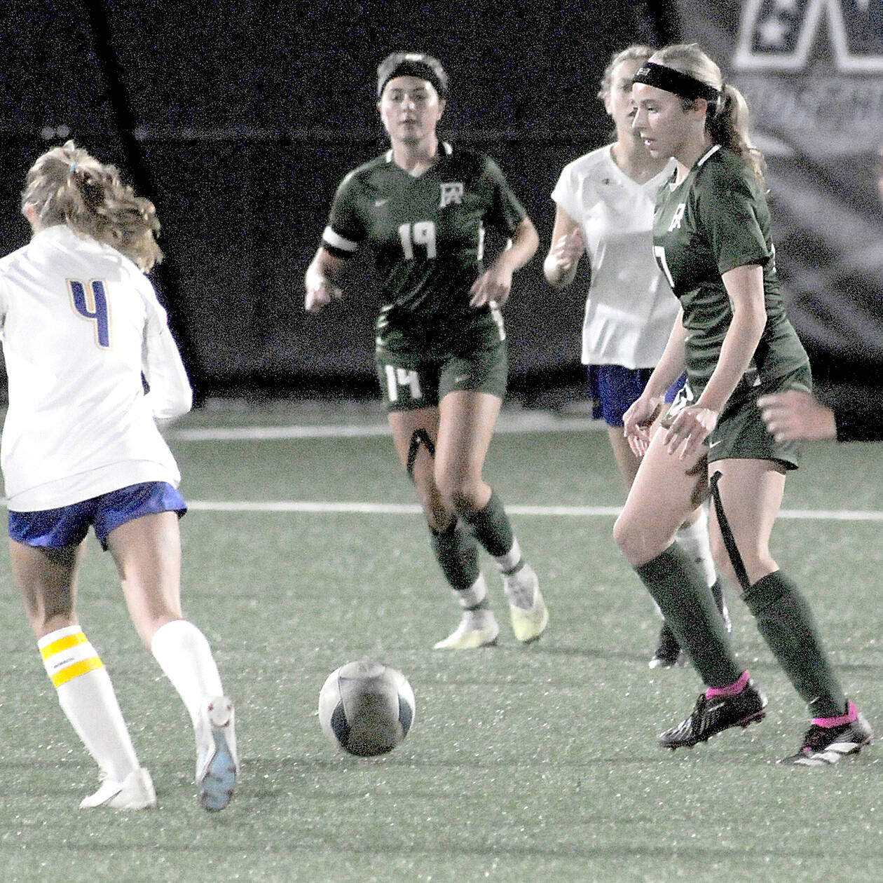 KEITH THORPE/PENINSULA DAILY NEWS
Port Angeles’ Ava-Anne Sheahan, right, is the Roughriders lone returning senior starter from last season’s state-bound girls soccer team. In the background is senior Maeve Croteau.
