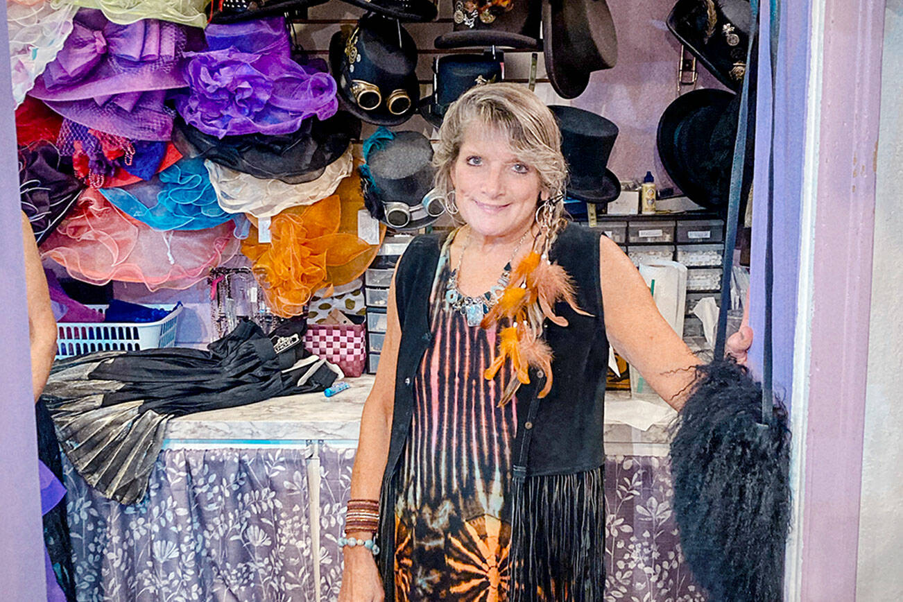 Denise Arey, owner of Expressions at 834 Water St. in Port Townsend, celebrates Girls’ Night Out during the 2023 event.