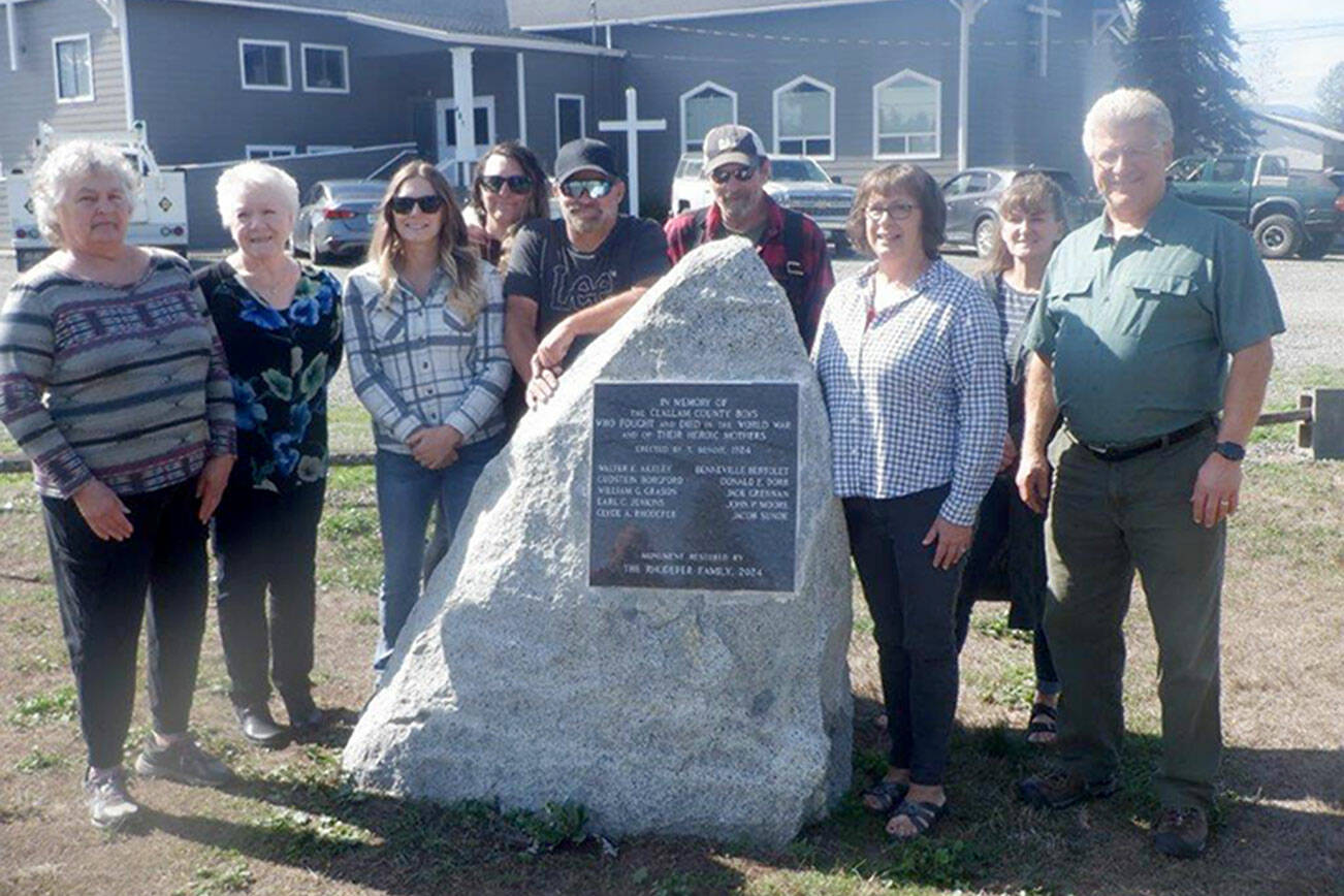 Pictured, from left, are Rhodefer family members Joan Morrish, Patty Brueckner, Bailey Rhodefer, Kenzi Rhodefer, Dean Rhodefer, Jay Rhodefer, Anita Reynods and Keri Rhodefer along with Carlsborg Family Church’s Pastor Jerry Luengen
