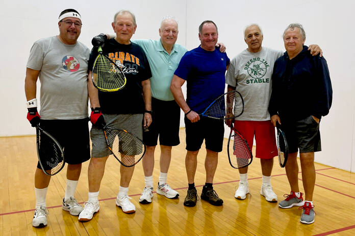 Every morning at 6, six local men are on the racquetball courts of the Port Angeles YMCA. The players — from left, Henry Pimentel, 70, Roy Gotham, 79, Carl Gay, 74, Todd German, 58, Frank Burke, 76, and Jerry Allen, 69 — say the friendly games are good for cardio and camaraderie. Gotham and Gay have been playing together for more than 40 years. (Paula Hunt/Peninsula Daily News)