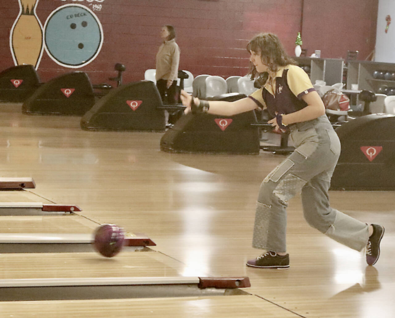 Sequim’s Victoria Nava rolls in a match Monday against Port Angeles at Laurel Lanes. Nava led the Sequim bowlers with a two-game score of 313 while Port Angeles’ Zoey Van Gordon led all bowlers with a 337 . (Dave Logan/for Peninsula Daily News)