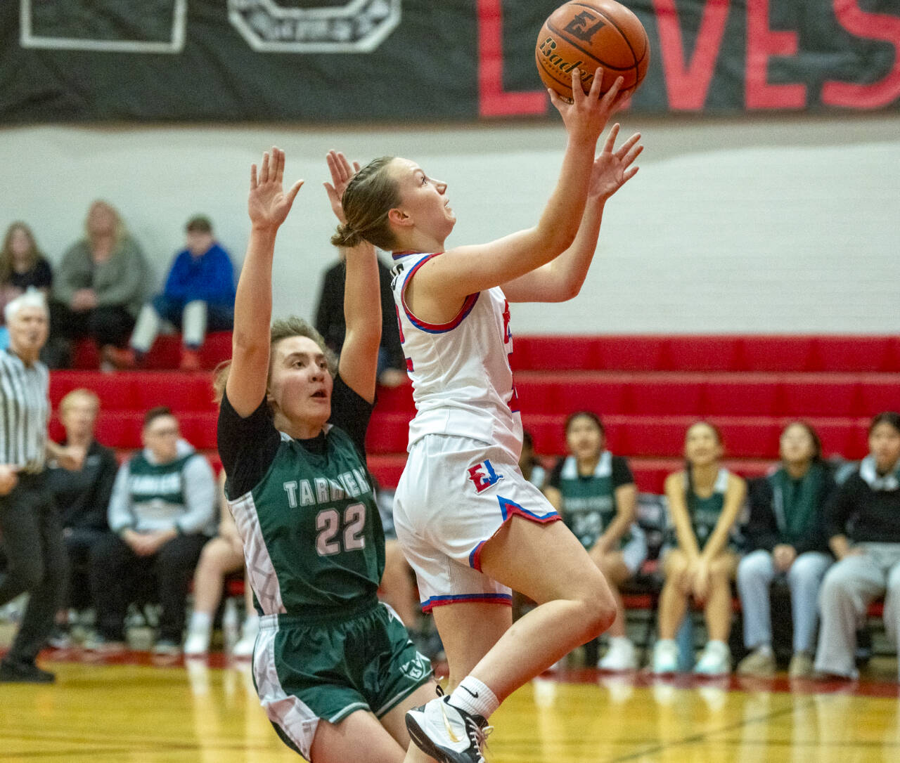East Jefferson’s Kaydence Plotner drives for a basket against Charles Wright on Monday. Plotner had 18 points and 12 steals. (Photos by Steve Mullensky/for Peninsula Daily News)