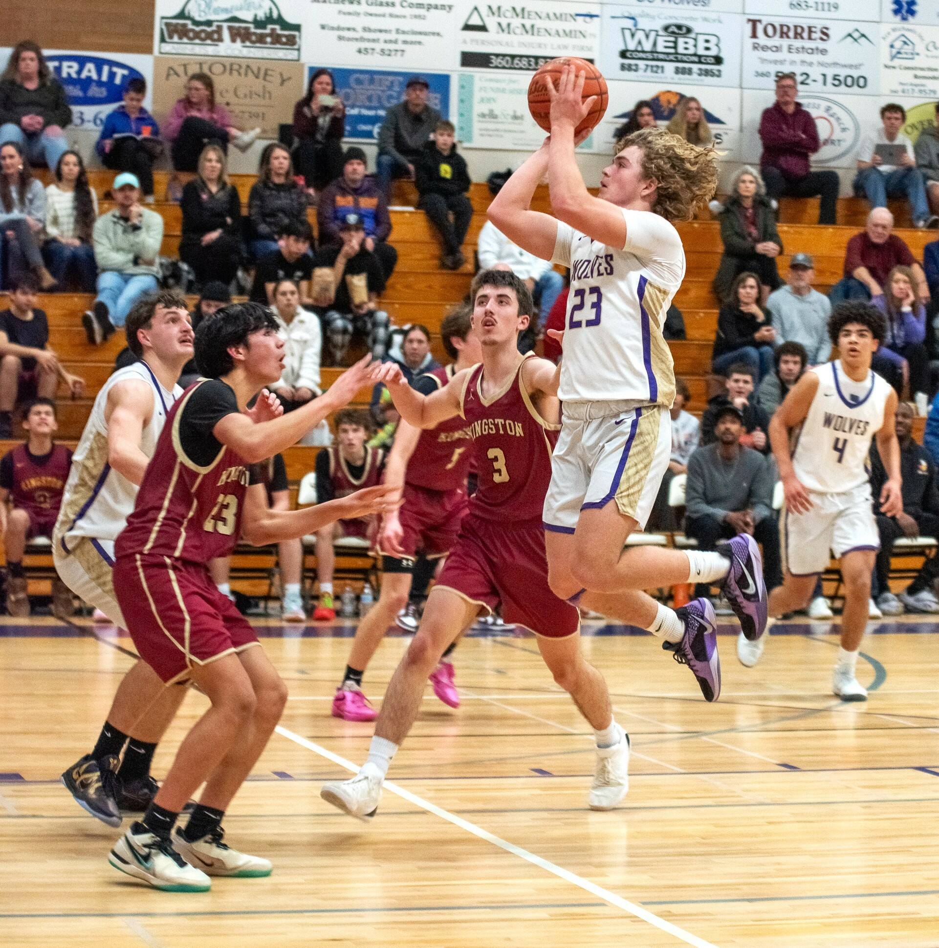 Sequim’s Zeke Schmadeke (23) goes up for a shot against Kingston on Friday. (Emily Matthiessen/Olympic Peninsula News Group)