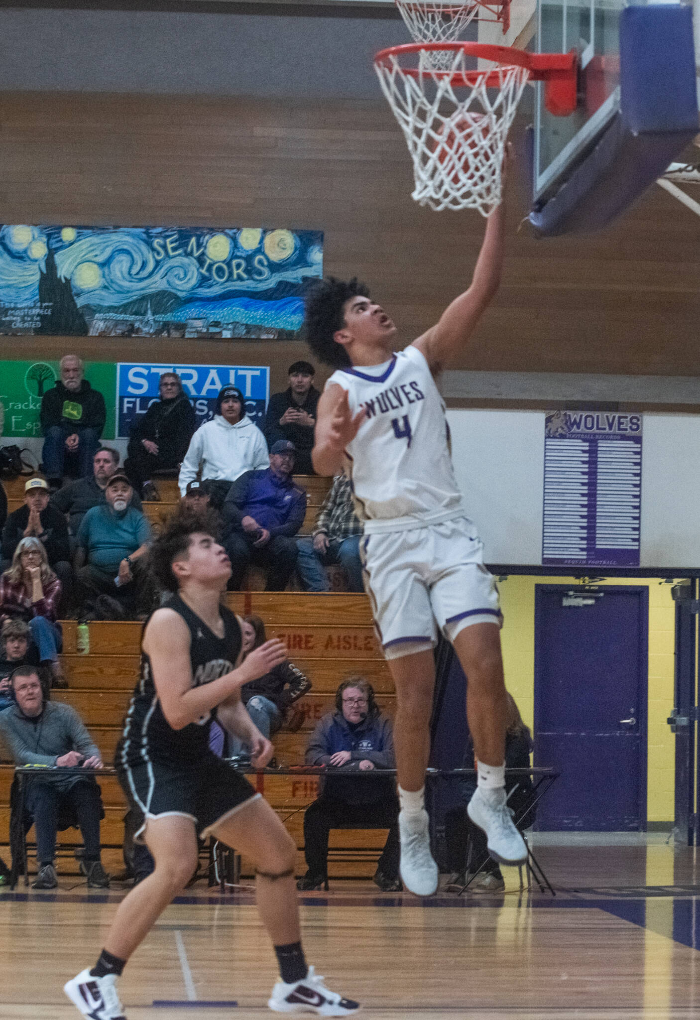 Emily Matthiessen/Olympic Peninsula News Group
Sequim’s Jericho Julmist rises for a layup during an early season win over North Kitsap. The sophomore has turned in a number of impressive performances this season.
