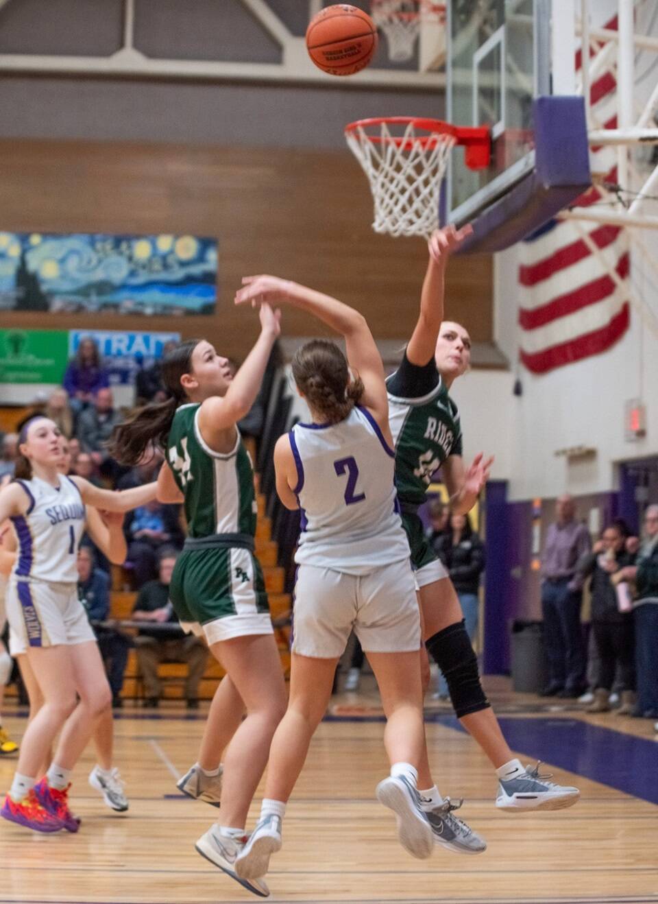 Port Angeles’ Teanna Clark (10) defends a shot by Sequim’s Manuela Valle Jover (2) in a game Friday in Sequim. Also in on the play are Sequim’s taylor Heyting (1) and Port Angeles’ Lexie Smith (34). Emily Mathiessen/Olympic Peninsula News Group