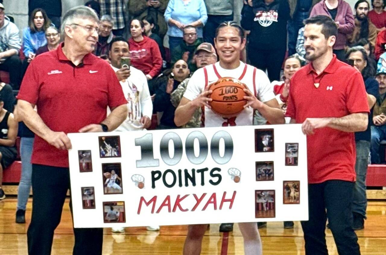 Neah Bay's Makyah Chambers was honored Friday night for scoring his 1,000th point for the Red Devils. (Courtesy of Neah Bay basketball)