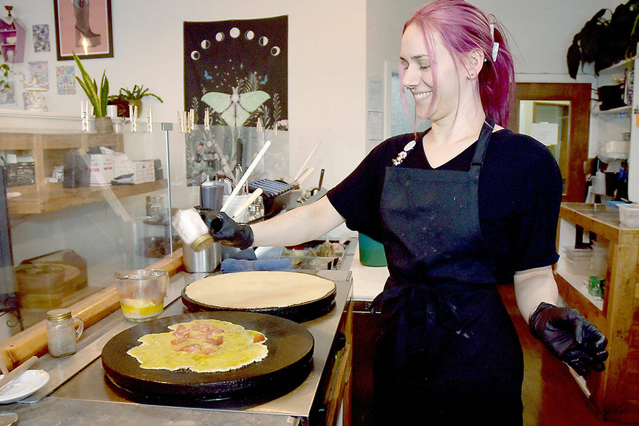 Shay Christensen, owner of the Pink Pony Café in downtown Port Angeles, creates a designer crepe. (Keith Thorpe/Peninsula Daily News)