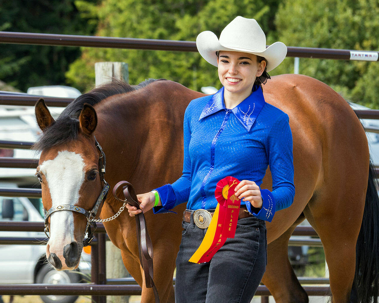A happy Hannah Grace Nordstrom, with Carolina, exiting their halter class with ribbons in hand at the Jefferson County Fairgrounds 4-H show in 2018. (Submitted photo)