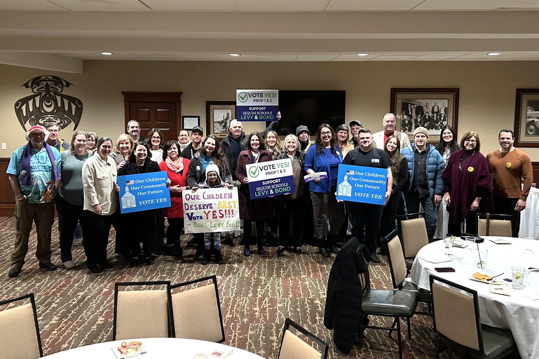 Sequim School District administrators, staffers, families and supporters gather in Stymie’s Bar and Grill on Feb. 11 after they learned the district’s bond and levy proposals were passing. (Matthew Nash/Olympic Peninsula News Group)