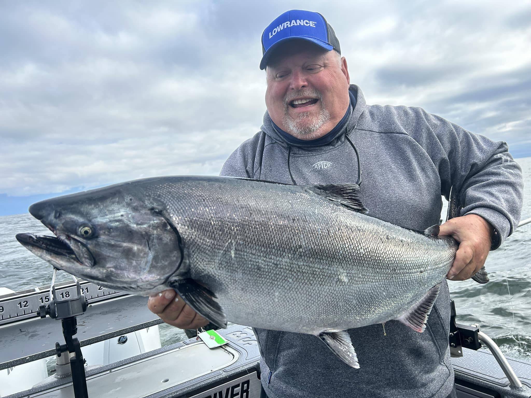 Roy angler John Keizer caught this chinook while fishing off the coast last summer. Salmon seasons negotiations are underway this month.